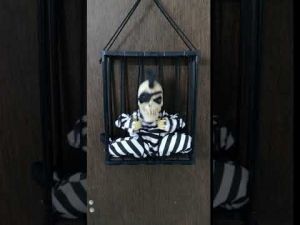 Cage One Eye Scary Skeleton Musical Hanging Halloween Toy
